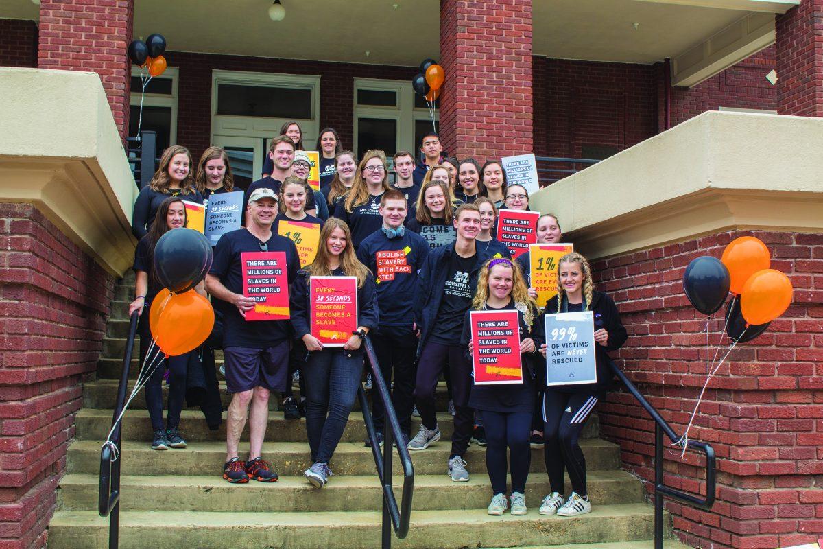 Students gather in front of the YMCA building in the center of MSU’s campus for A21’s annual Walk for Freedom protesting human trafficking. trafficking.