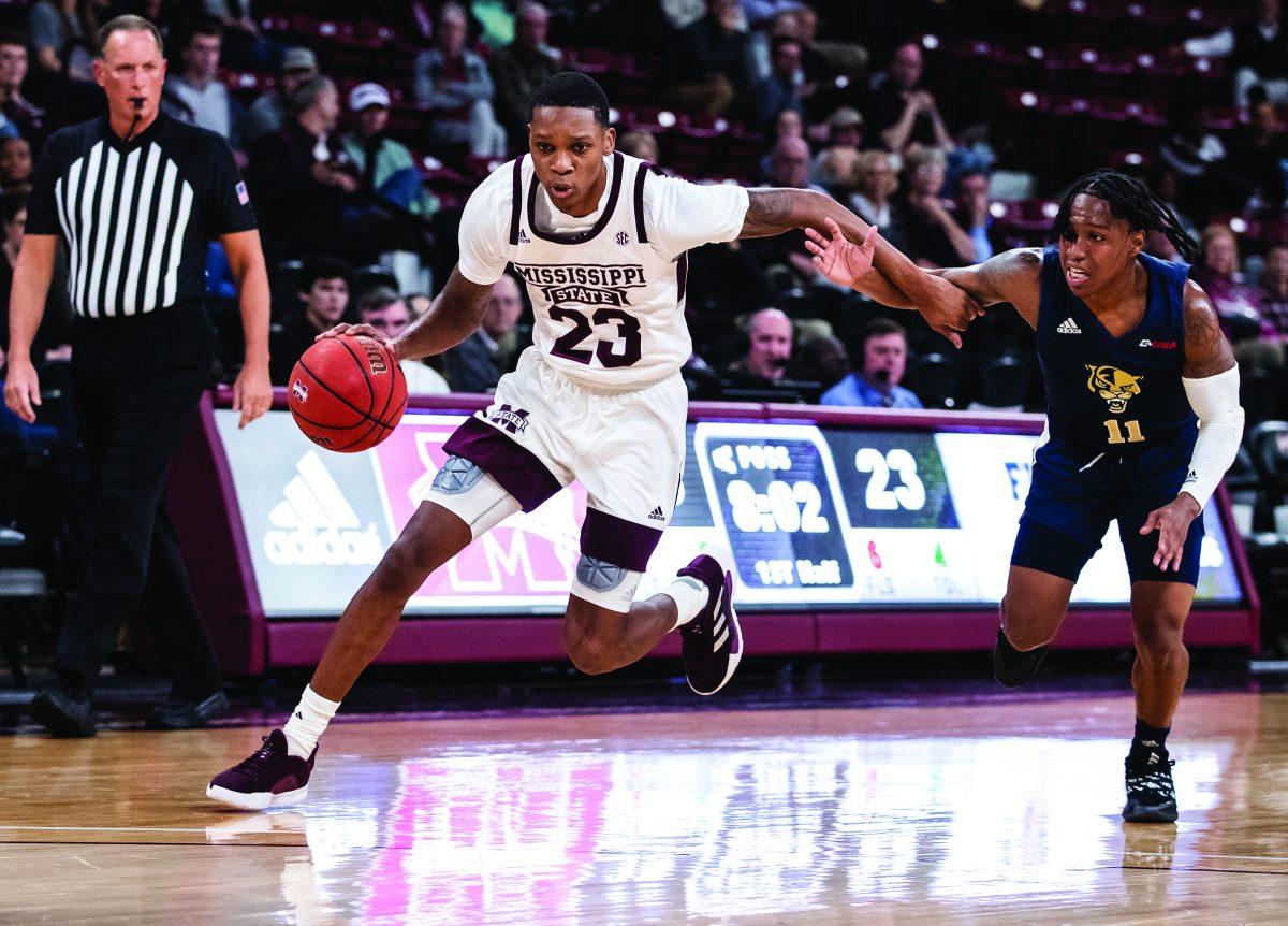 Tyson Carter dribbles past an FIU defender. Carter had 23 points and seven rebounds in MSU’s 77-69 win against FIU on Tuesday night.
