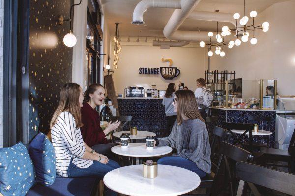 Mississippi State University engineering students Kamryn Clymer, Ashleigh Dunaway and Abby Praytor, start off the spring semester with coffee at the new Strange Brew location in Starkville’s Midtown.