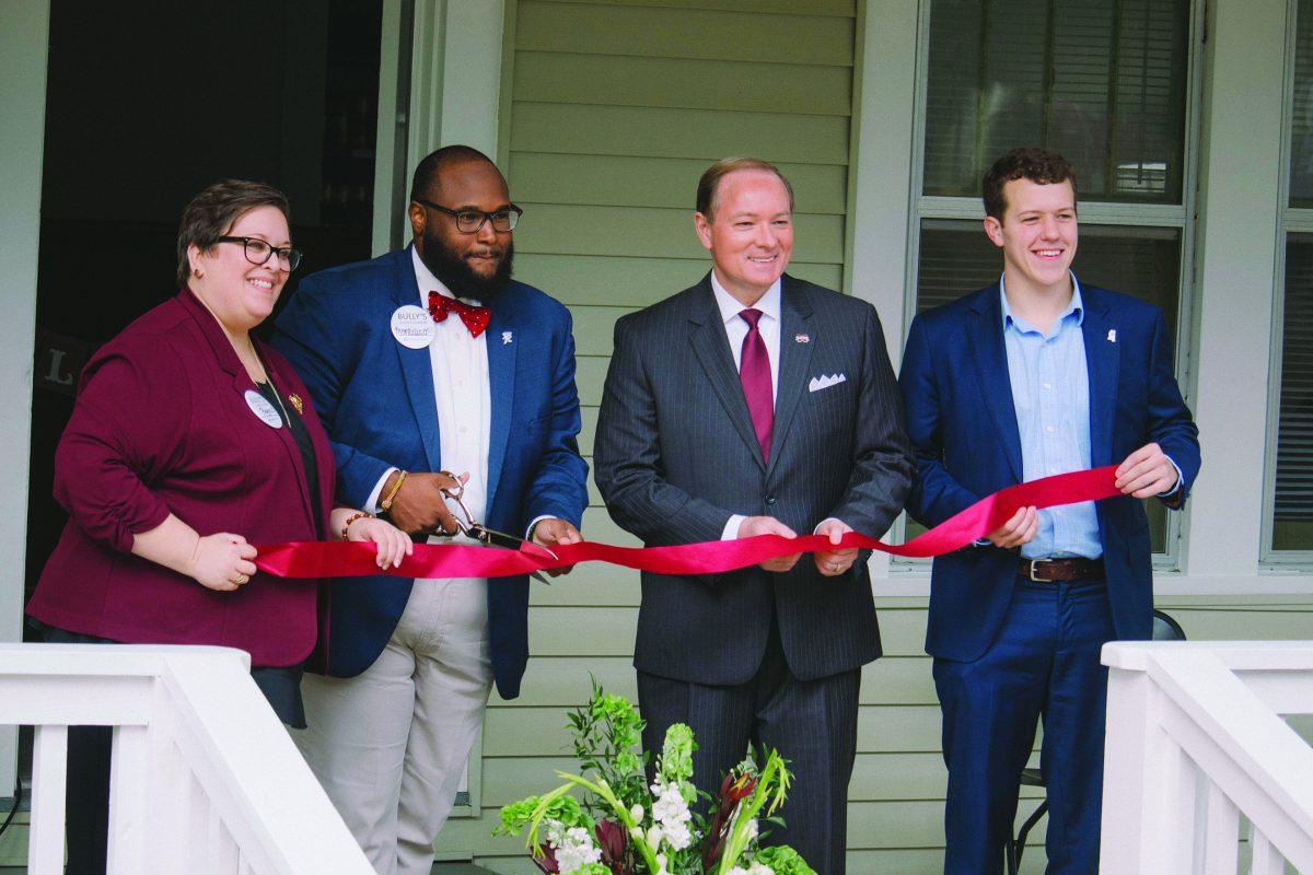 VP for Student Affairs Regina Hyatt, Behavioral Interventions Coordinator Montelleo Hobley, University President Mark Keenum and SA President Jake Manning prepare to cut the ribbon at the grand opening of Bully’s Closet and Pantry at 120 Morgan Ave. The Pantry will provide food and clothing to MSU students experiencing food insecurity and financial need.