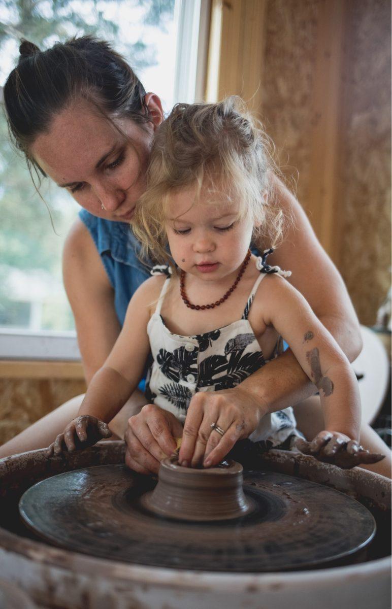 Charis+Brightwell+of+Taproot+Pottery+is+pictured+with+her+daughter.