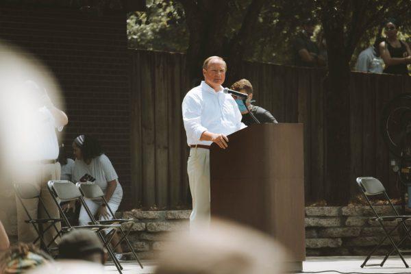 President Mark Keenum speaks to the crowd of the Justice March at the MSU Amphitheater.