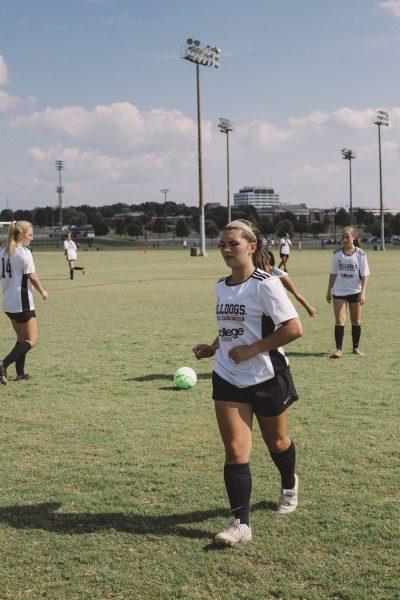 Sophomore Deme Courtney warms up for a club soccer game at the University of Alabama.