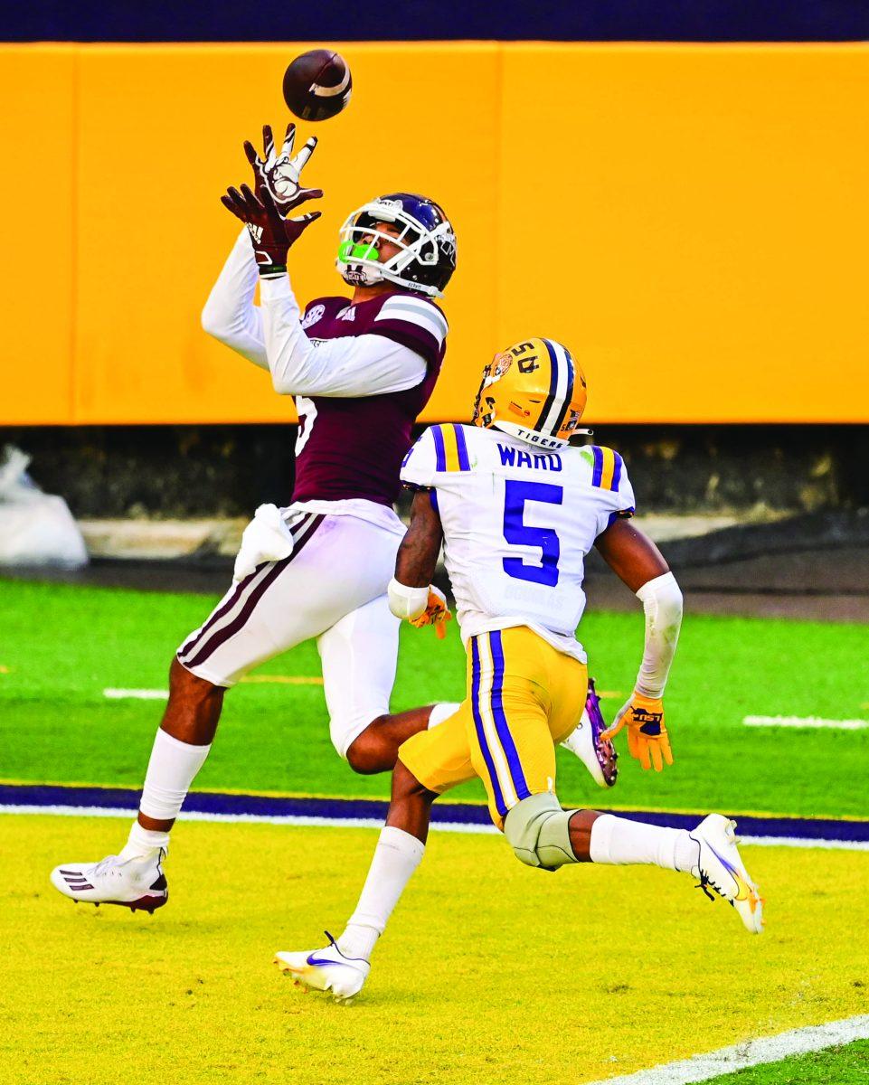 Osirus Mitchell, a senior wide receiver from Sarasota, Florida, receives the ball during Saturday’s game at Louisiana State University, where the Bulldogs beat the Tigers 44-34.