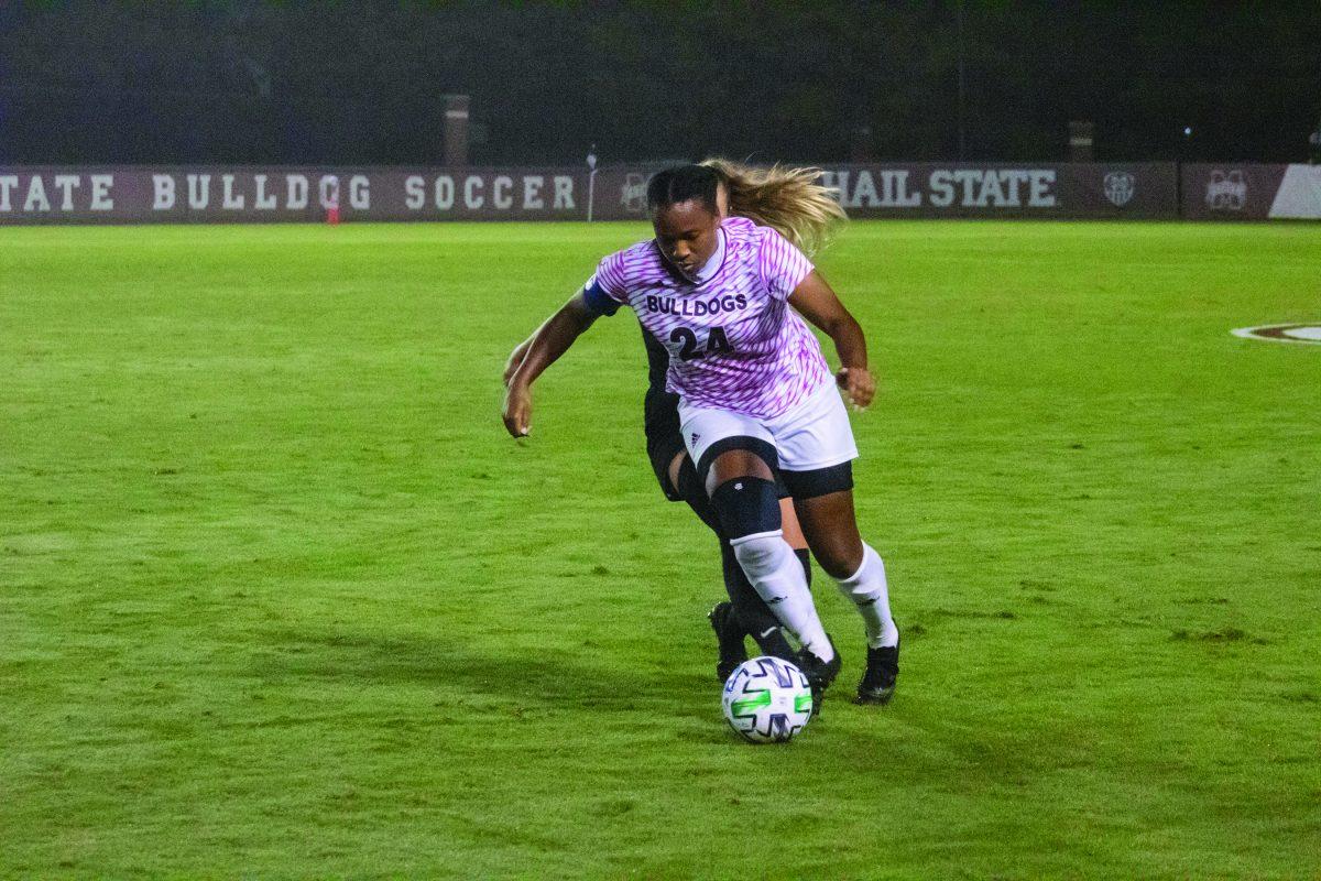 Kristen Malebranche, a senior biochemistry major on the pre-med track, plays her role as defender during Saturday’s game between the Bulldogs and the Tigers where the teams tied 1-1.