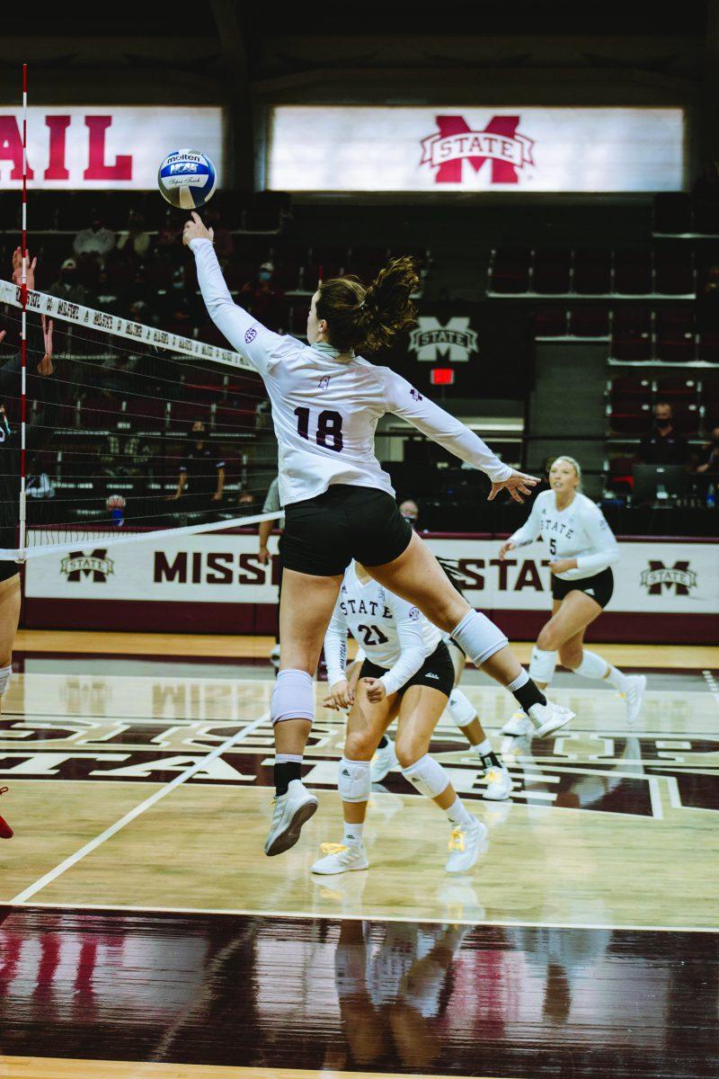 Lauren+Myrick%2C+sophomore+outside+and+right+side+hitter+from+Louisville%2C+Kentucky%2C+goes+up+for+a+hit+in+Saturday%26%238217%3Bs+match+between+the+Bulldogs+and+Aggies+where+Myrick+totaled+12+kills.