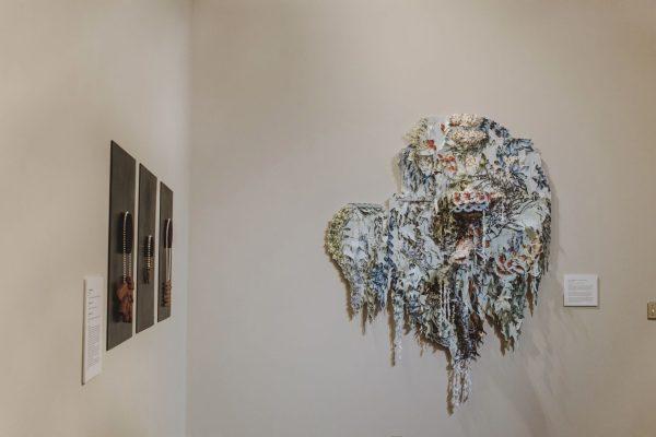 Two of the pieces featured in “Crafted Identities” are shown. The exhibition features works from 12 artists from different parts of America.