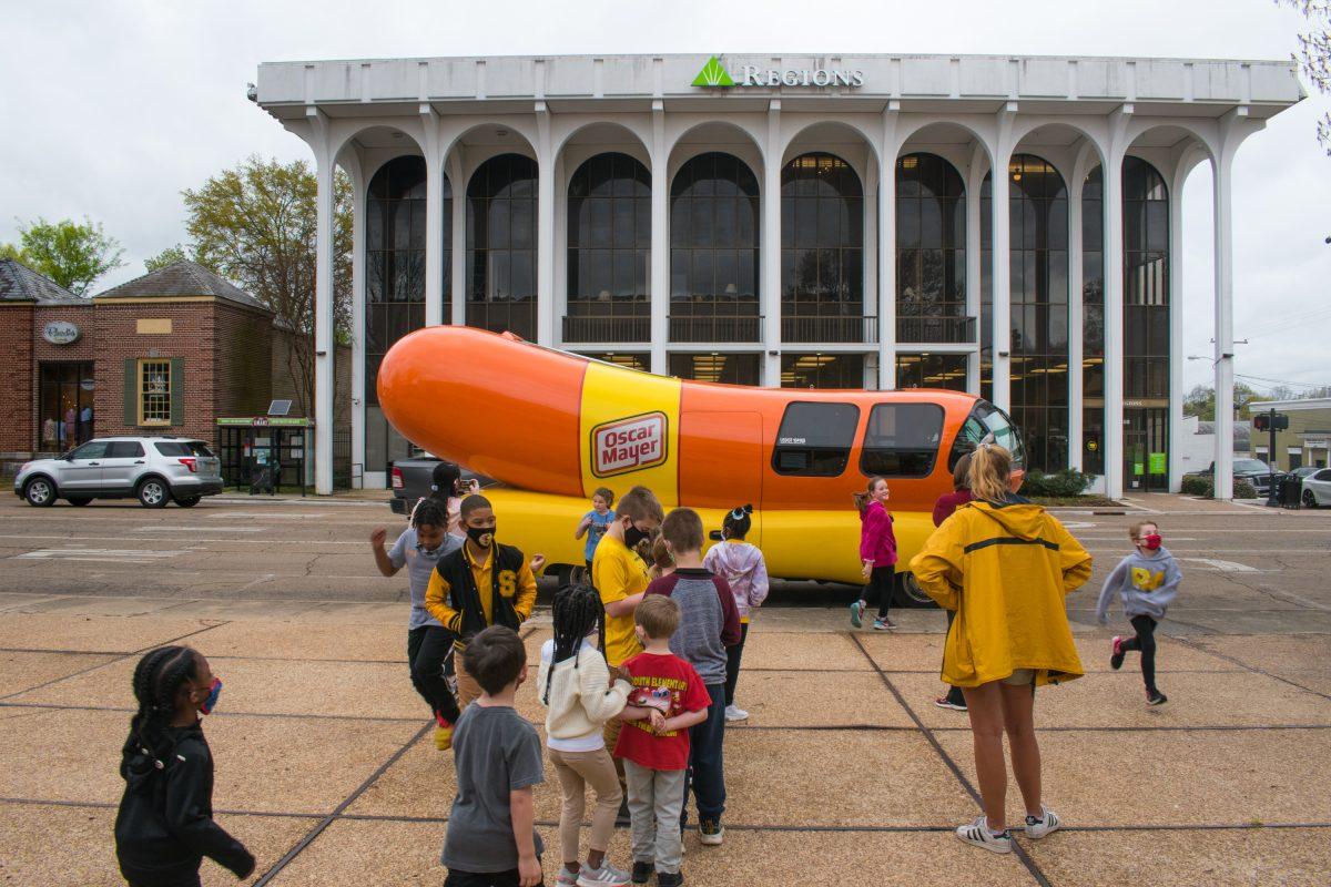  ‘Frank-fanatics’ of all ages gathered outside Cadence Bank on Main Street to eat hot dogs and get a glimpse of the famous Oscar Mayer Wienermobile this past Tuesday.