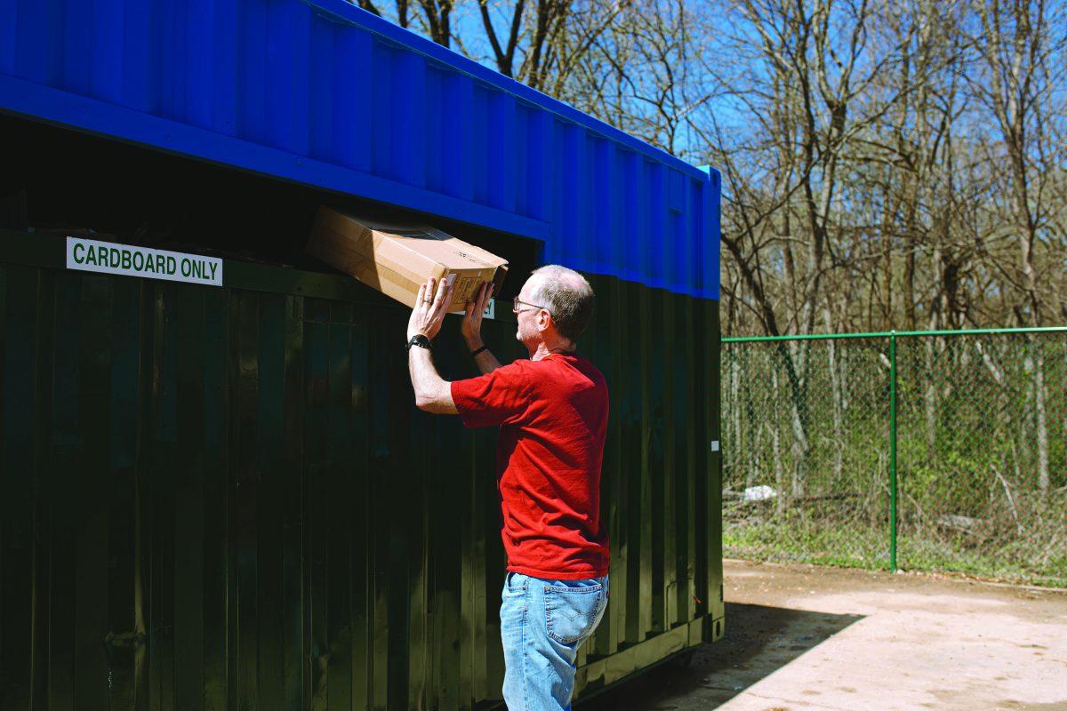Bryan O’Neill, Starkville resident, recycles empty boxes while utilizing Starkville’s new recycling drop-off location. The new system aims to allow recycling at a cheaper cost than before.