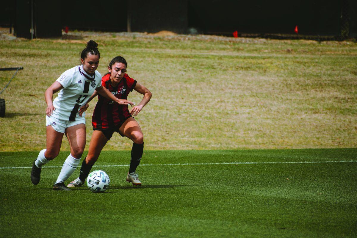 Marcella Cash protects possession of the ball during a match against Arkansas State University on Saturday in Starkville, Mississippi.