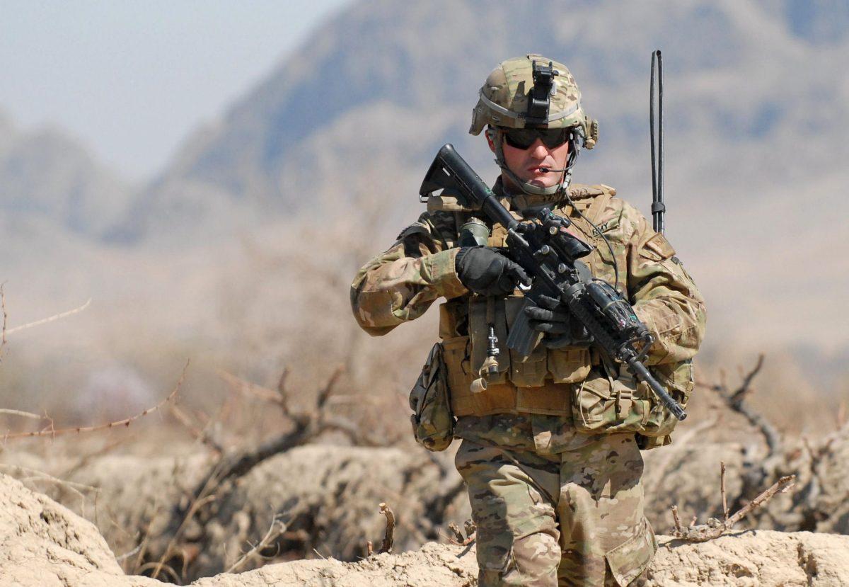 A U.S. soldier patrols near Combat Outpost Kowall in Kandahar, Afghanistan in 2011.