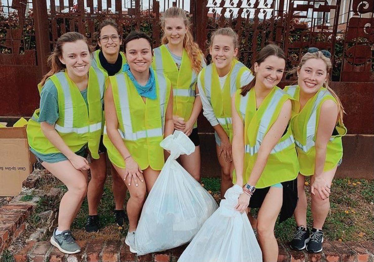 Members of the Hands & Feet Club during their trash pick-up service project. This project’s goal was to keep Starkville beautiful.