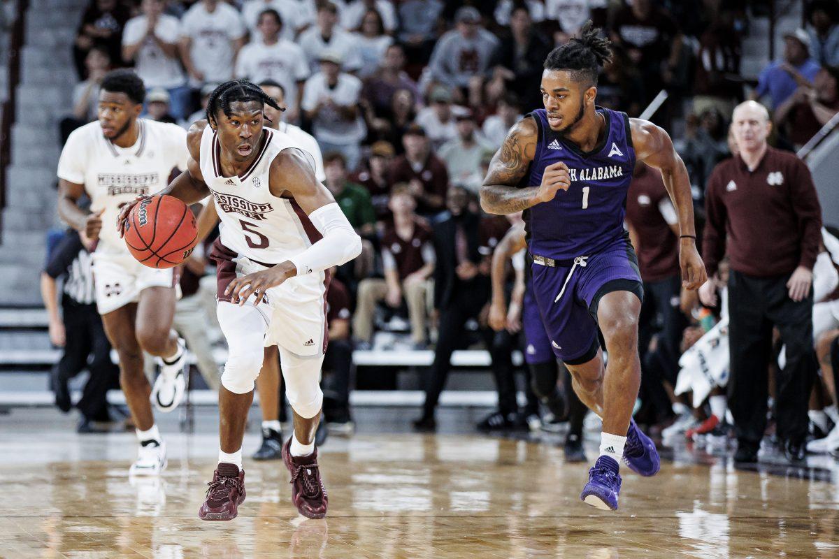 Freshman guard Cam Carter brings the ball up the floor against UNA in Wednesday nights game.
