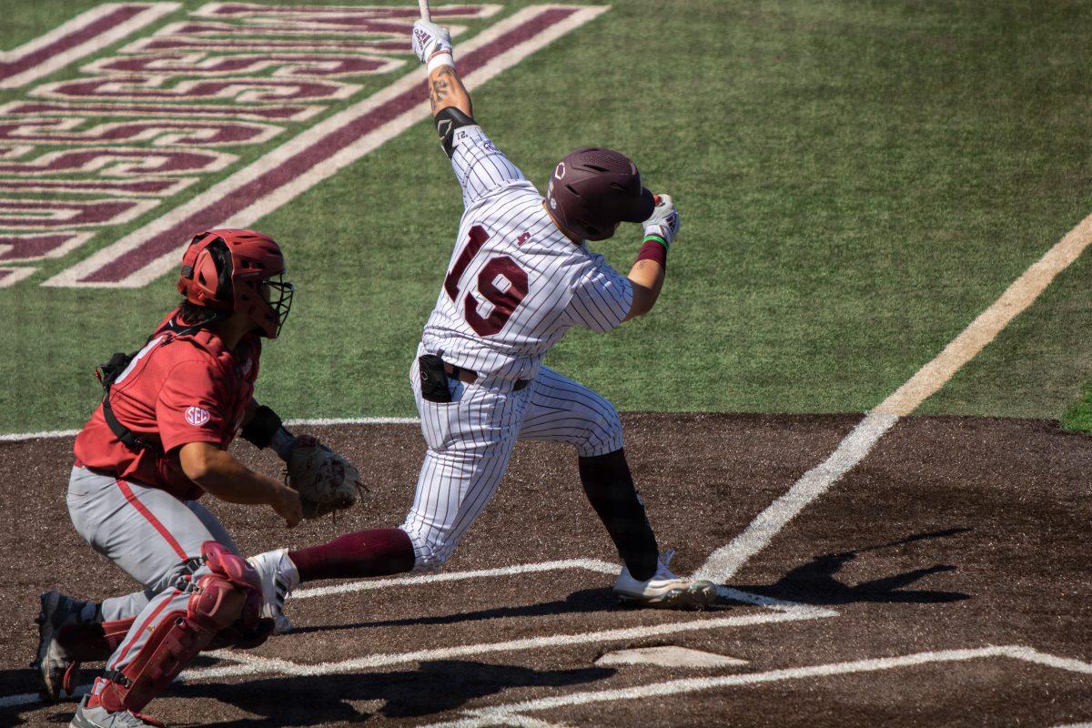 Logan Tanner takes a swing during previous action this season against the University of Alabama.