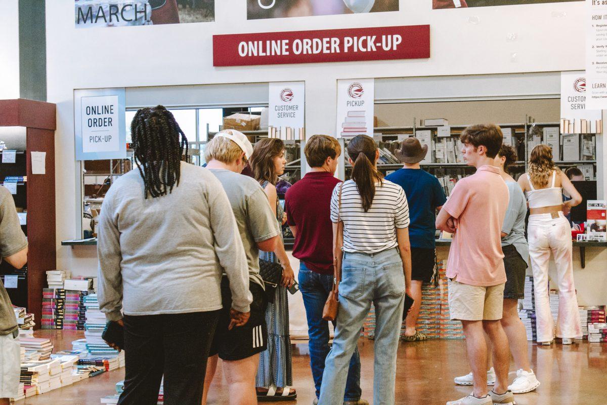 On the second floor of Barnes and Noble, students wait in line to pick up class materials that are included in the Bulldog Bundle.