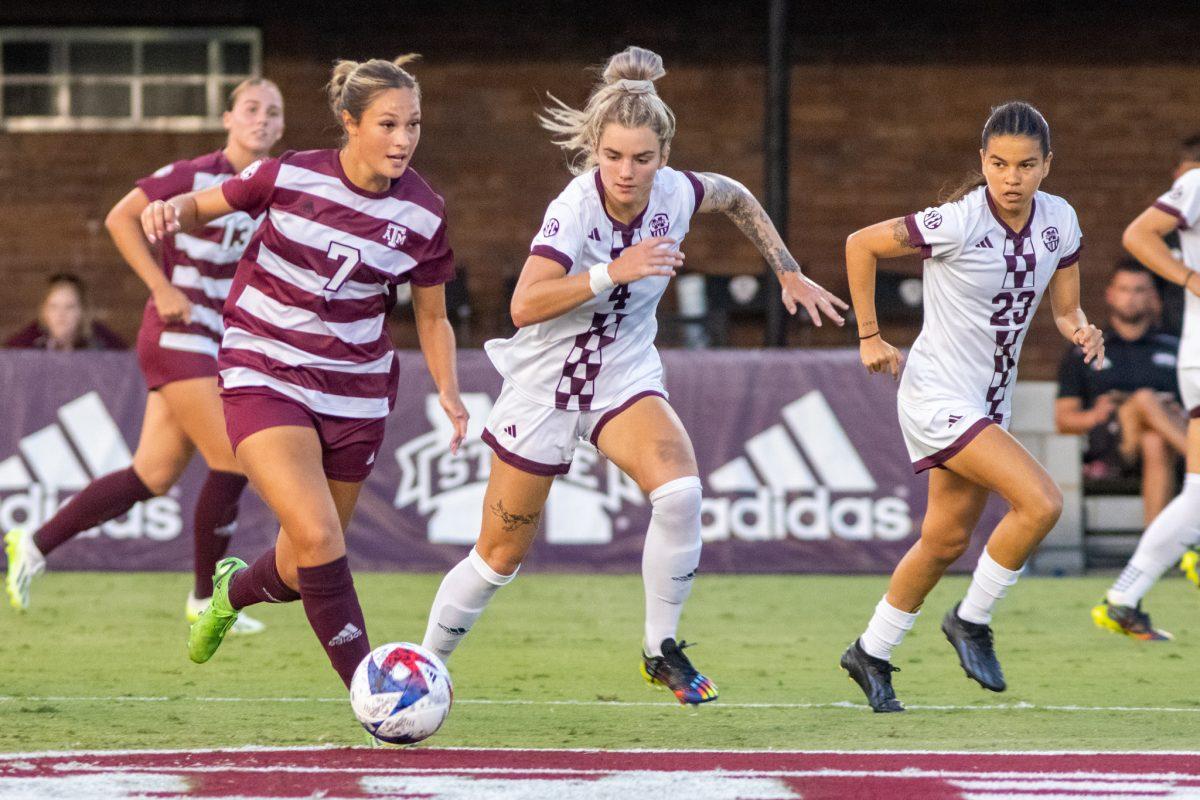 <p>MSU midfielder Macey Hodge going head to head for the ball.</p>