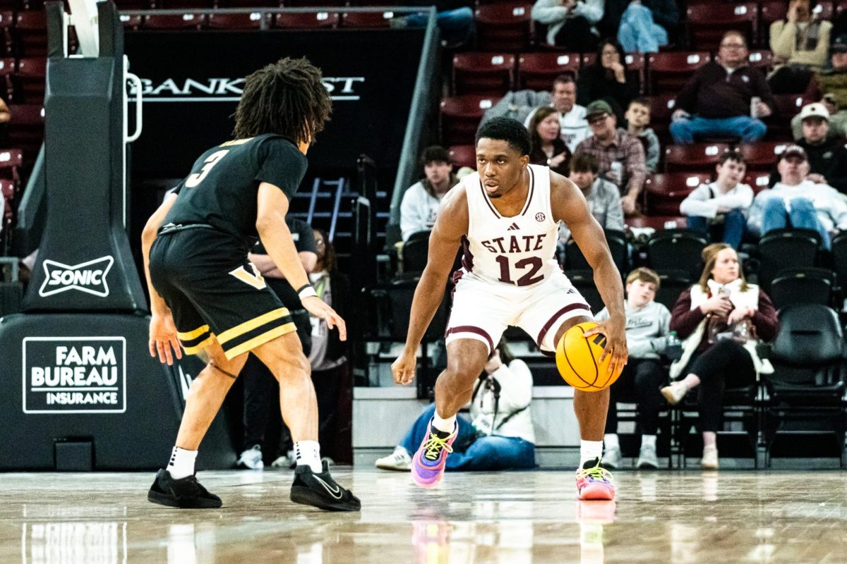 Mississippi State basketball guard Josh Hubbard dribbles a basketball in on the court during the game against Vanderbilt on Jan. 24.