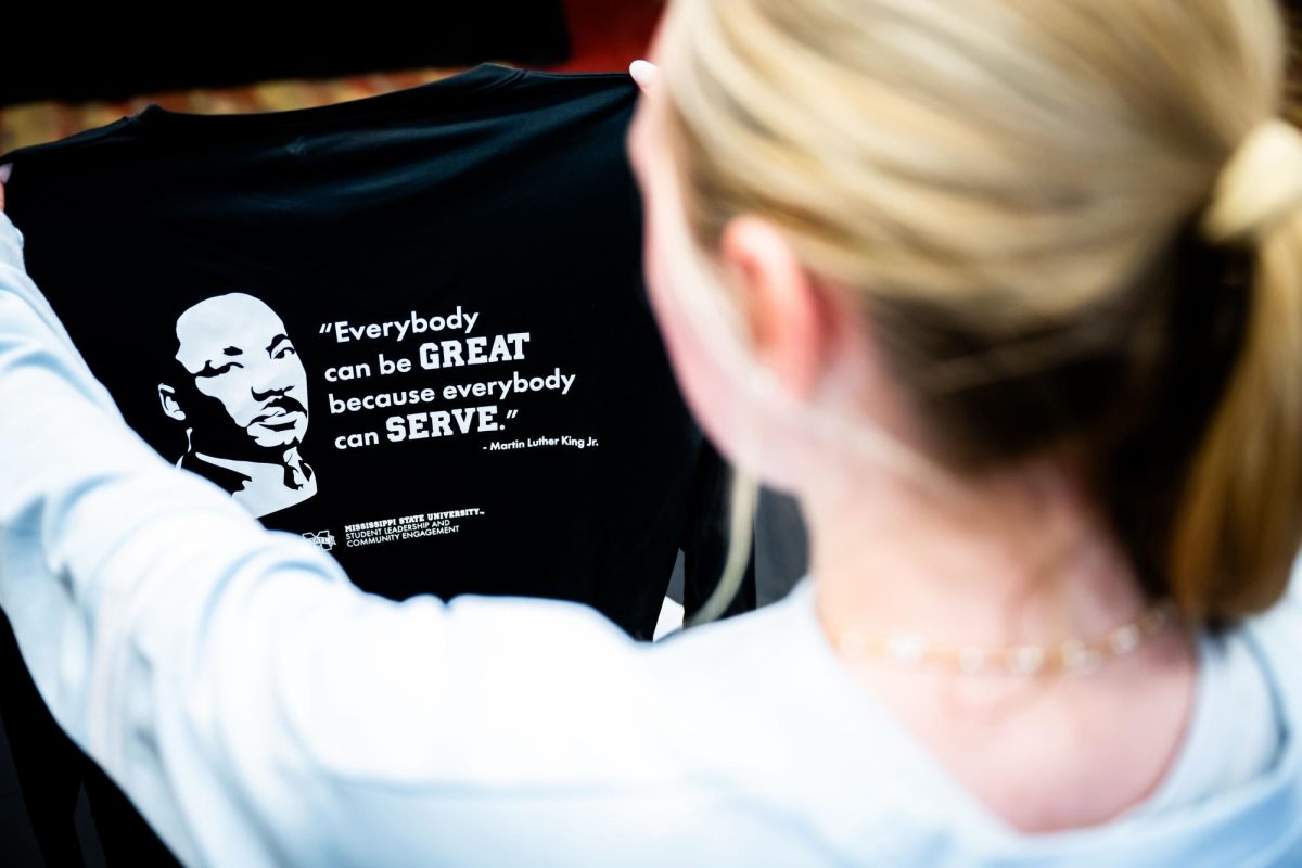 Students assemble hundreds of winter survival kits for homeless community during MLK Days of Service
