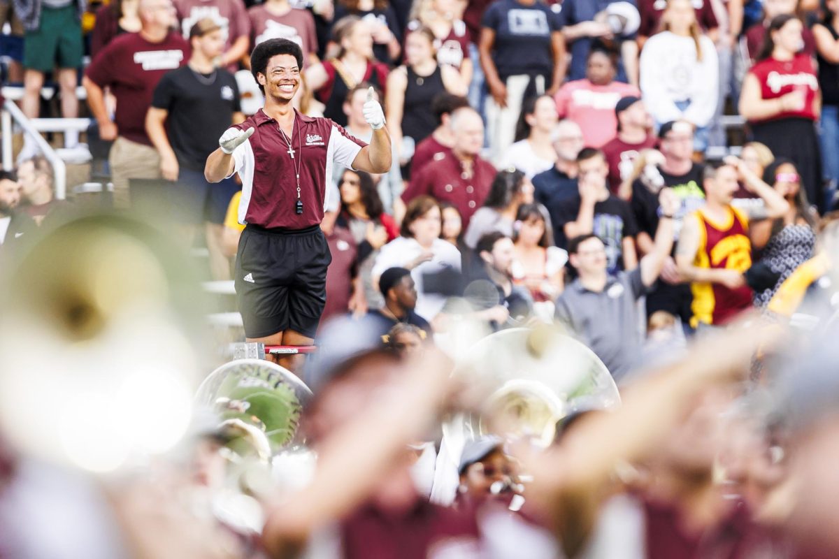 Jolivette smiles as he conducts the Famous Maroon Band during the game against ASU on Sept. 6.