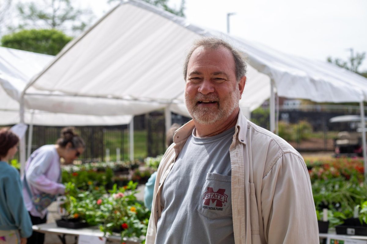 Richard Harkess, advisor for MSU’s Horticulture Club, smiles at the 2024 plant sale. 