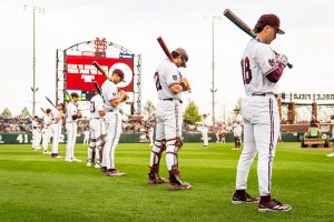 Baseball players participate in a pre-game preparation activity for a game at Dudy Noble Field against Georgia.