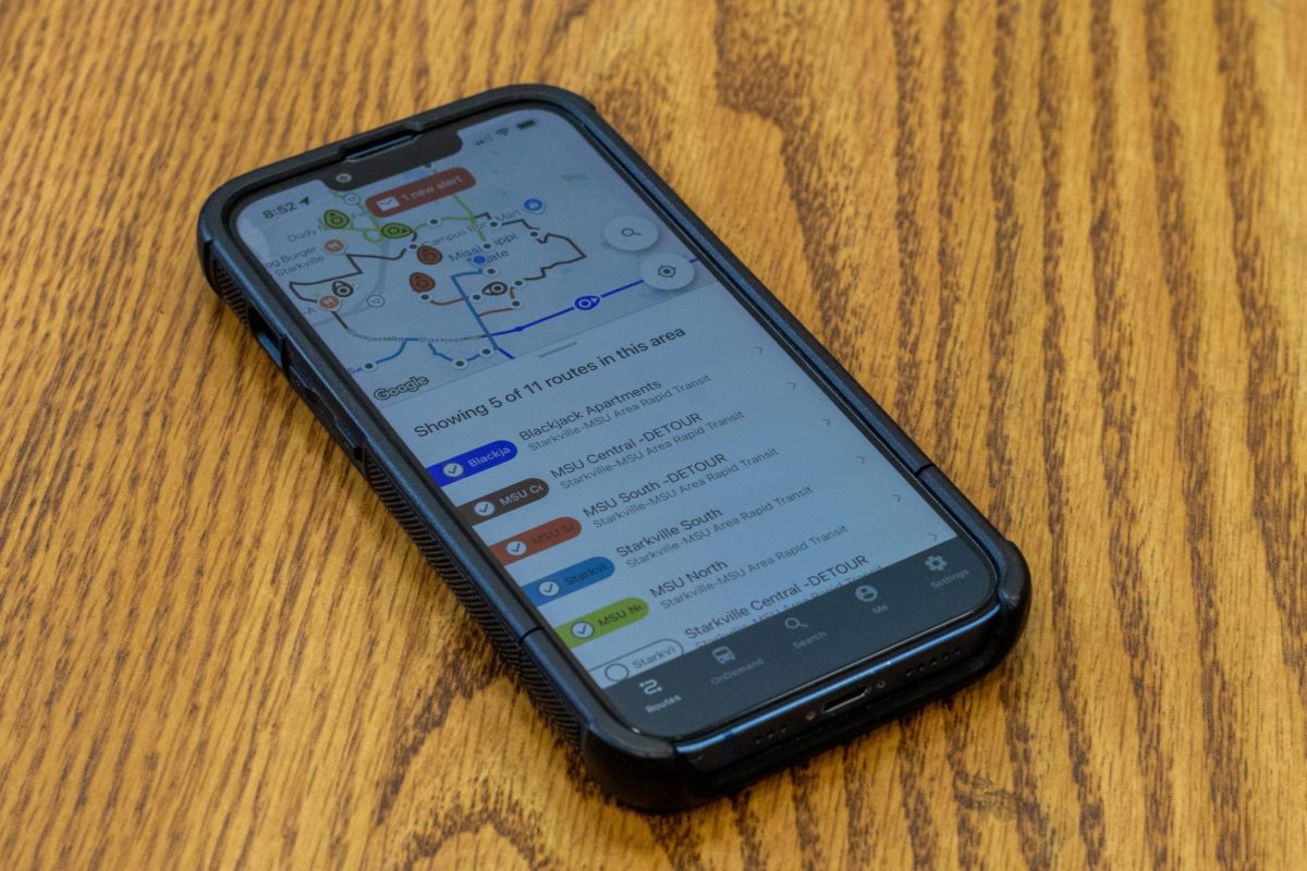A smartphone with a map of the bus routes. 