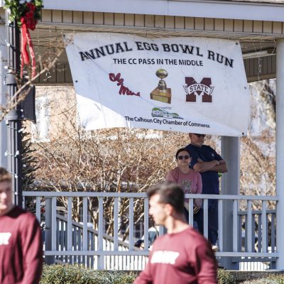 November 22, 2025 - 11:40 AM - The Calhoun City Chamber of Commerce hosts the handoff during the Egg Bowl Run.