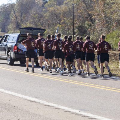 November 22, 2025 - 1:27 PM - Mississippi State Army and Air Force ROTC cadets run during the Egg Bowl Run in Calhoun City.