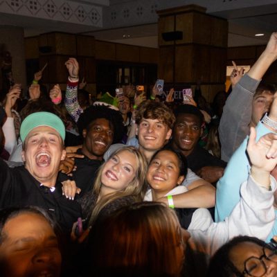 Ravers smile as the DJ plays The Hey Song.