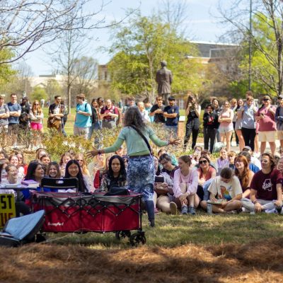 Hundreds of students gathered in the Allen Hall courtyard to hear Smock talk.